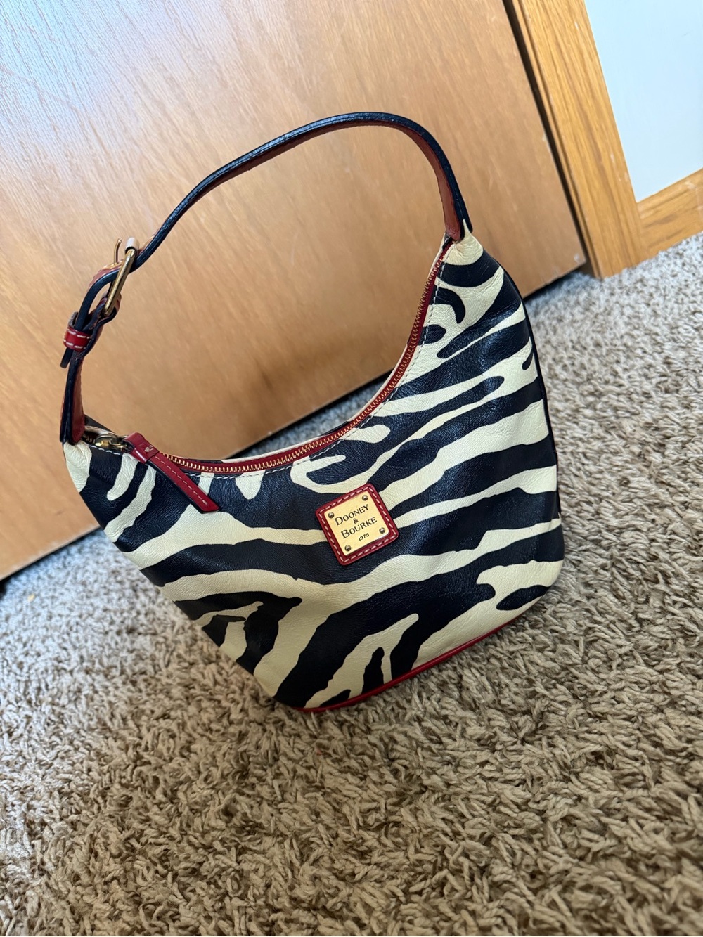 Dooney & Bourke Black and Cream Zebra-Print shoulder bag with Red Trim